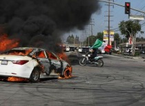 洛杉矶抗议活动升级，70多人被捕引关注